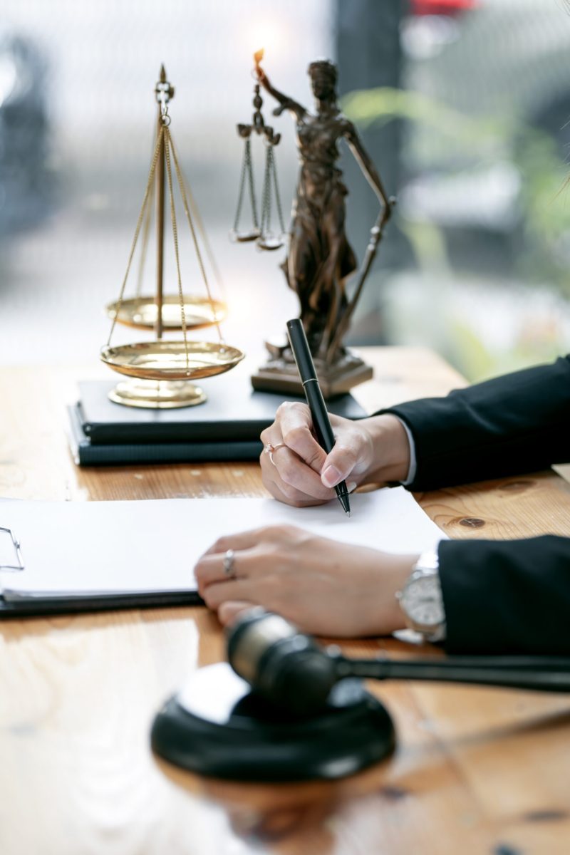 Justice lawyers, Businesswoman in suit or lawyer working on a documents. Legal law, advice and justice concept.